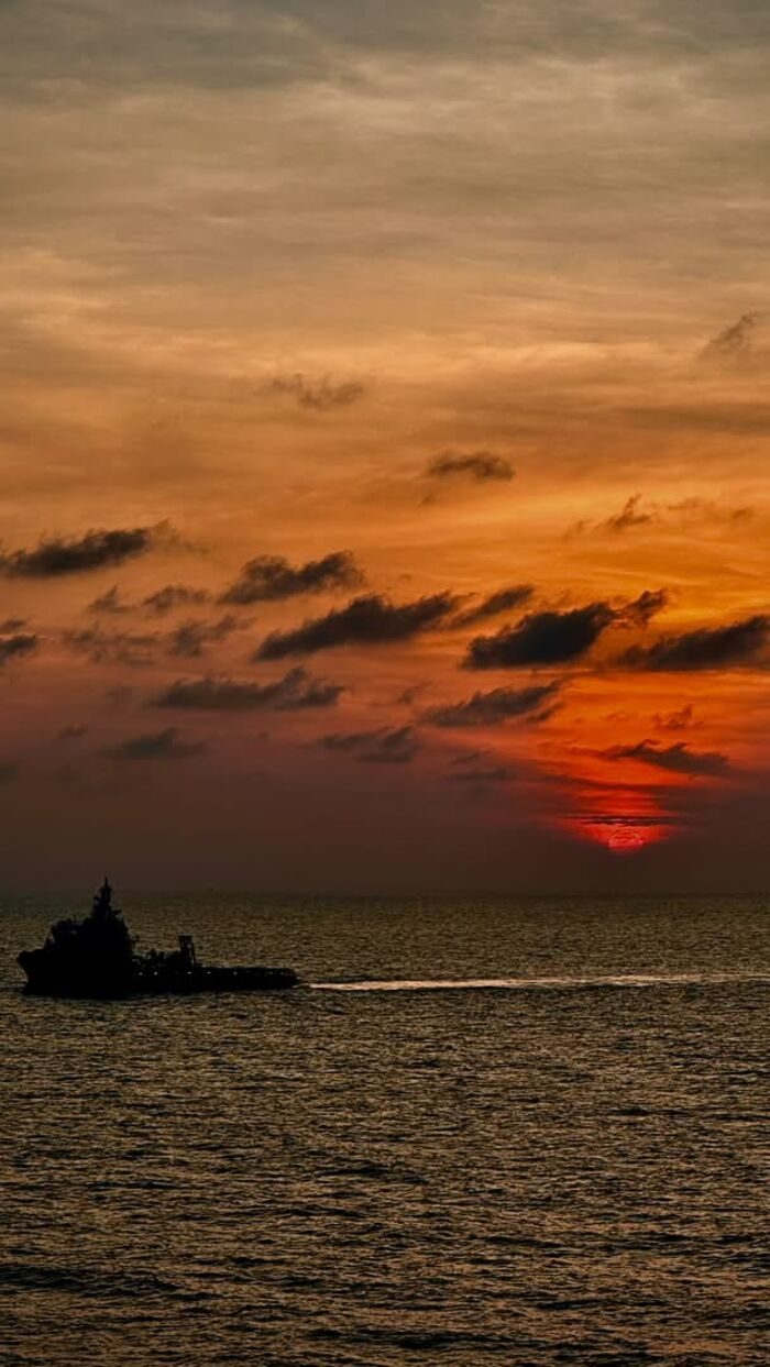 Supply vessel at sunset